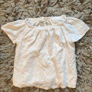 I am selling one white Abercrombie Kids blouse.